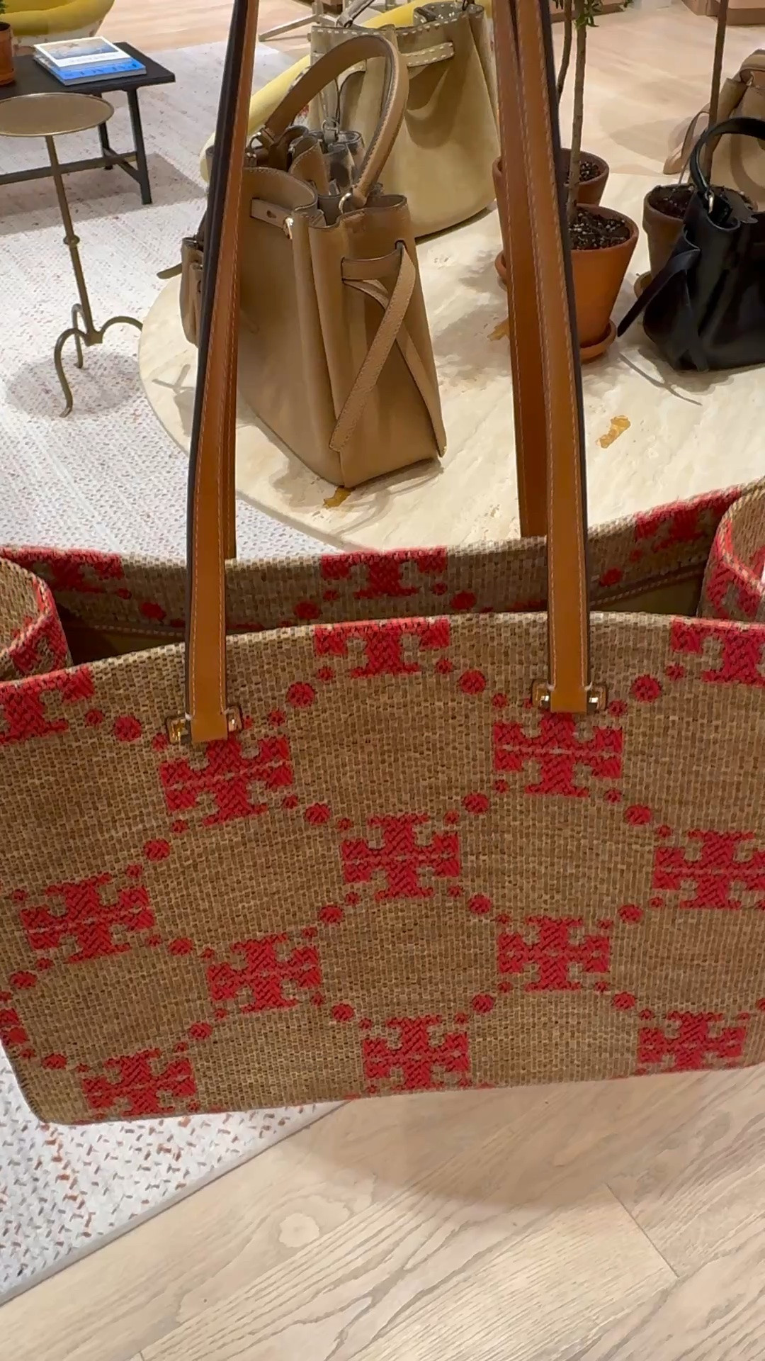 Such a chic totebag with a touch of red.  Woven bag, summer bag