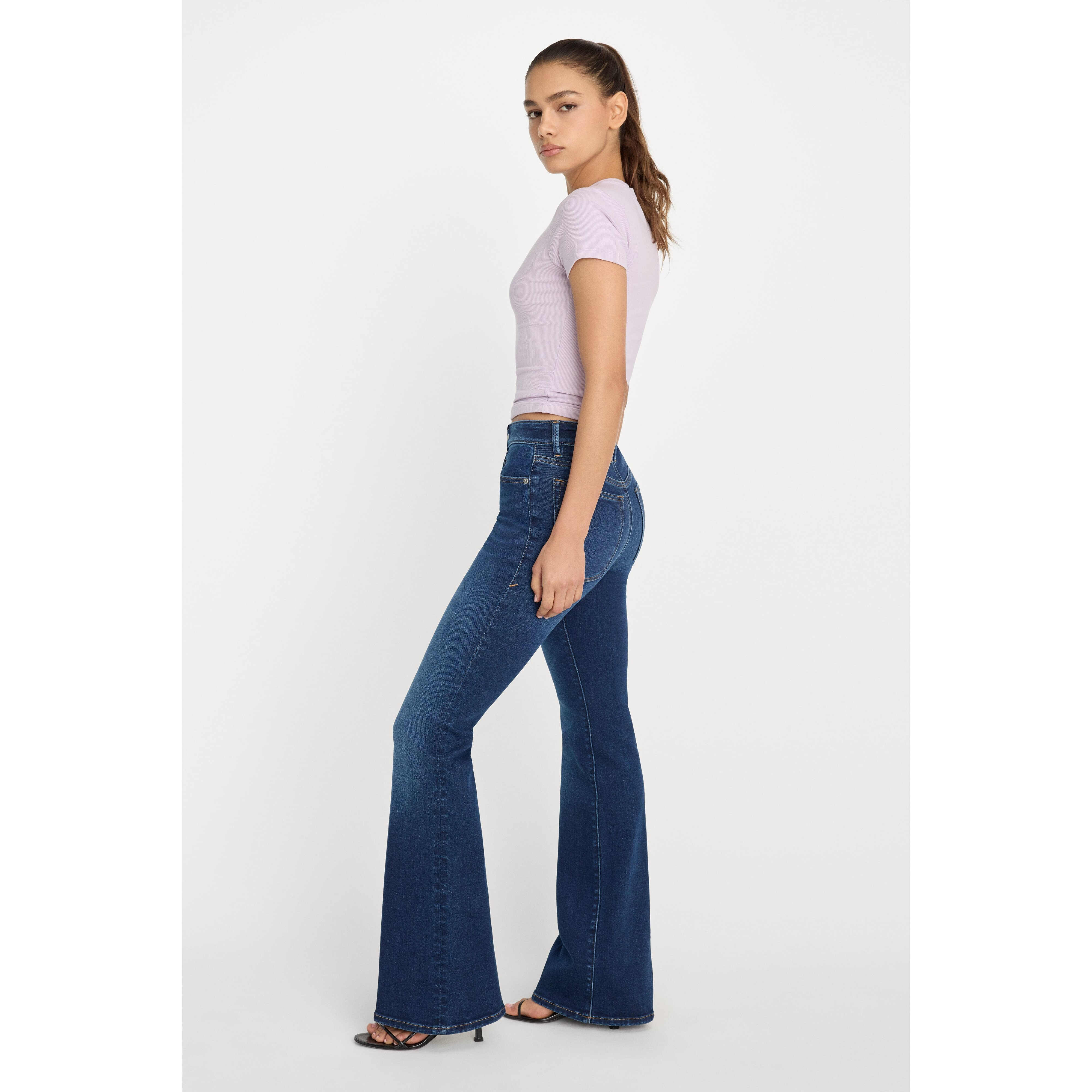 Women's Compression Good Legs Flare Jeans | Extra Stretch, Flat Tummy Tech, Gap-Proof Waistband | Indigo, Size 30 Plus | Good Am | Good American