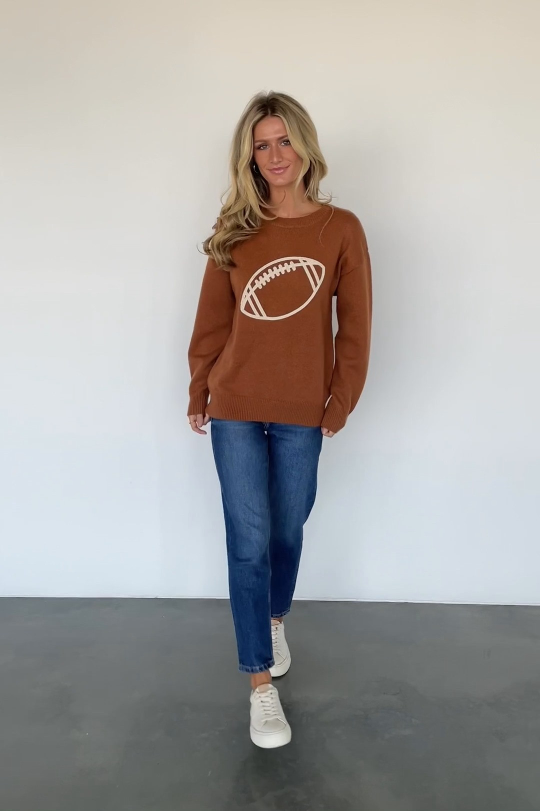 Loving this for a crisp fall football day 🍂🏈 Lightweight enough for daytime tailgating but cozy enough once the temperature drops later in the game. #BalticBorn #FootballSeason #GameDaySweater #TailgateOutfit #FallFootball #GameDayLook #LightweightSweater #FallFashion #AutumnOutfits #WeekendStyle 

 #LTKSeasonal #LTKU #LTKSaleAlert
