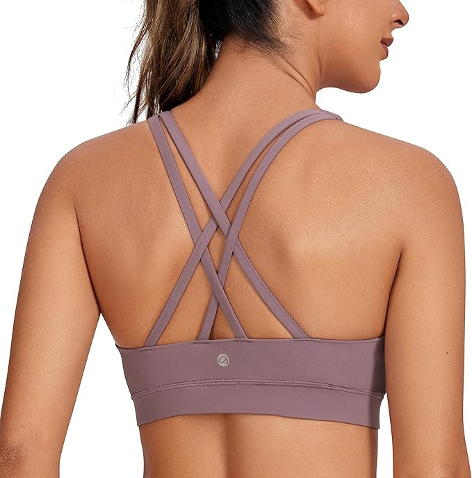 CRZ YOGA Women's Strappy Sports Bras Fitness Workout Padded Yoga Bra Criss Cross Back | Amazon (US)