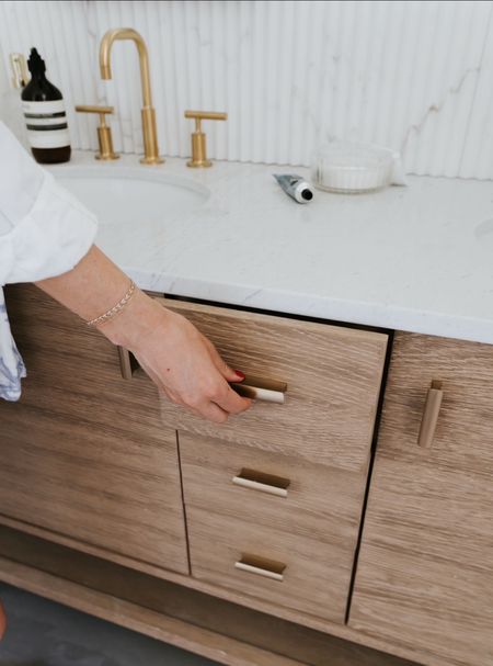 Love the wood and gold combination on this vanity 🙌🏼

#LTKHome