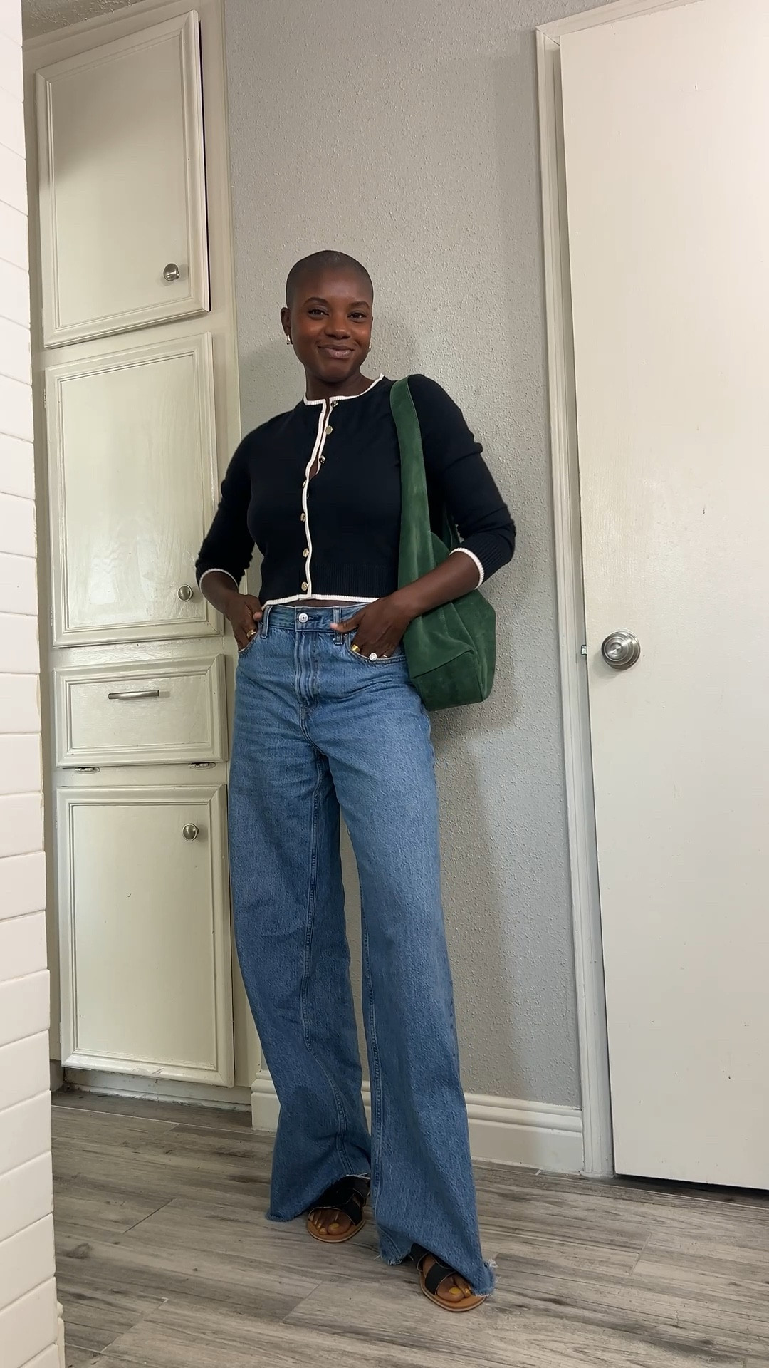 Fall outfit for brunch! Black cardigan with gold buttons, high waisted wide leg jeans, black leather sandals and a green suede bag  

#LTKFindsUnder100 #LTKFallSale #LTKStyleTip