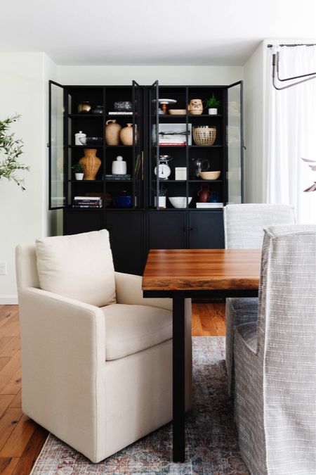 Modern dining room, dining room style, slipcovered chairs, black cabinet, modern organic home

#LTKhome #LTKsalealert