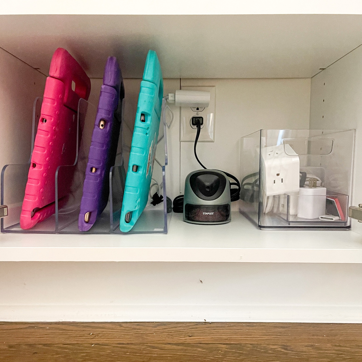 Back to School ipad charging station is complete! It’s so hard to find something to fit these bulky foam kids iPad cases. I repurposed this acrylic sorter and put the extra cords in a bin. 

#LTKBacktoSchool #LTKhome