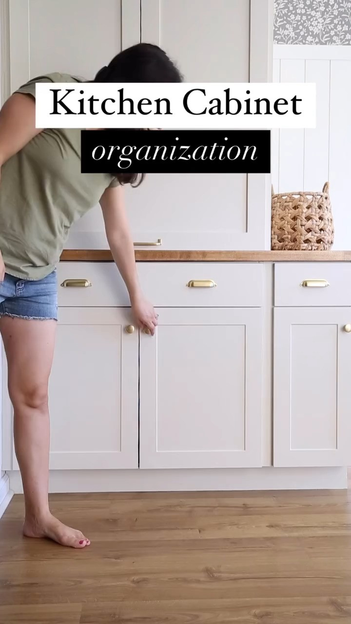 Kitchen cabinet organization! ✨ 4 ways I added storage and organization to our kitchen cabinets:  sliding pullout shelves, wall mounted paper towel holder, bakeware divider cabinet organizer, and a recycling bag cabinet door organizer!

#LTKVideo #LTKHome #LTKSaleAlert