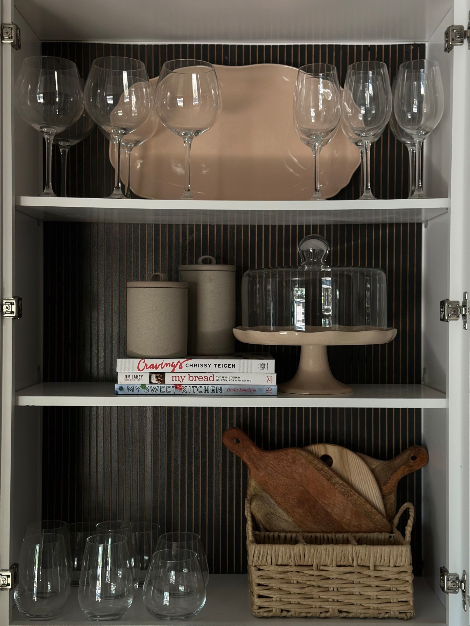 we did a minor diy to this cabinet to make it pop — pole wrap 🔨 + Serwin Williams iron ore 🎨 before styling  

#LTKHome