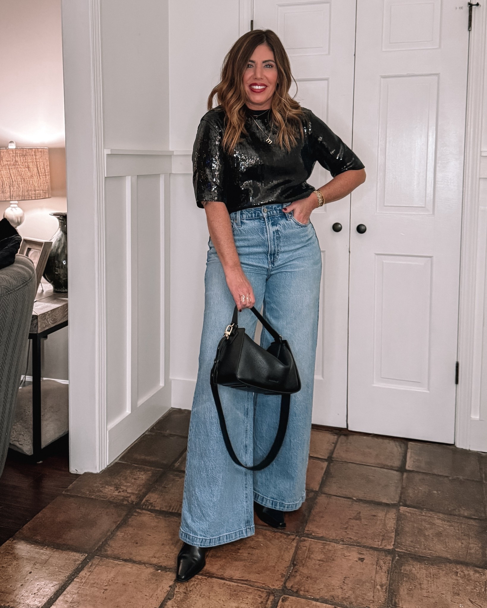 Easy casual holiday outfit for a party/ night out, & more!

Jeans are 25% off!! I’m wearing a 28

Top is so nice! Very comfy and a great holiday staple! Size medium 

My new bag is a gorgeous Italian pebbled leather. Great everyday size!

#LTKSaleAlert #LTKOver40 #LTKHoliday