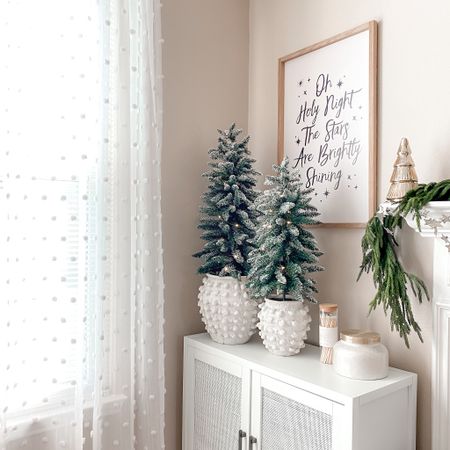 These Target trees fit perfectly in the #anthropologie Minka vases. 

#LTKunder50 #LTKhome #LTKHoliday