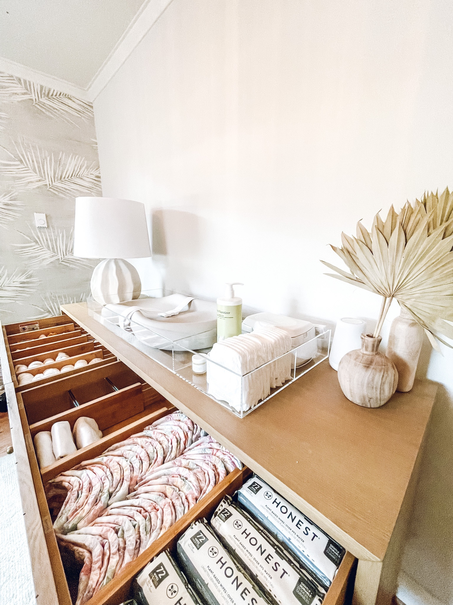 Nursery organization. Amazon Lipper dividers, BlossoME Ceramic White Vase, and Keekaroo Peanut Changer✨

#LTKhome #LTKkids #LTKfamily