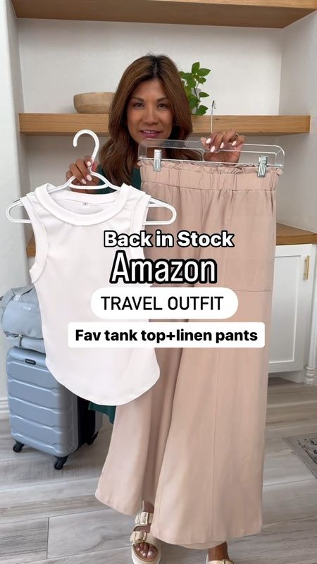 Travel outfit, airport outfit! Amazon’s summer’s best tank top and best linen pants! I have multiple colors in both. 
Tank top in small, color white; it is ribbed and not see through and you can wear regular bra. It’s stretchy and fits tts.
Linen pants in small, tts. Color Apricot. I’ve washed these pants in cold water in the washer and hung to dry and ironed: no shrinking! I looove! Great for travel, work, or casual.
Denim jacket in small. My fav and restocked! Also linking another one.
Sandals fit tts. One of my most worn sandals last spring and summer. I have it in black too. You can wear sneakers with this outfit too and linked Adidas Sambas that would look great.
The green dress at beginning of reel in small, tts, linked.
Puffer bag, light gray bag, and luggage are all linked as well! 
Travel outfit, airport outfit, Amazon finds, linen pants that are petite-friendly, casual dress, casual outfit, spring outfit, summer outfit, fashion over 40, outfit ideas, mom outfit, petite style. 



#LTKVideo #LTKTravel #LTKOver40