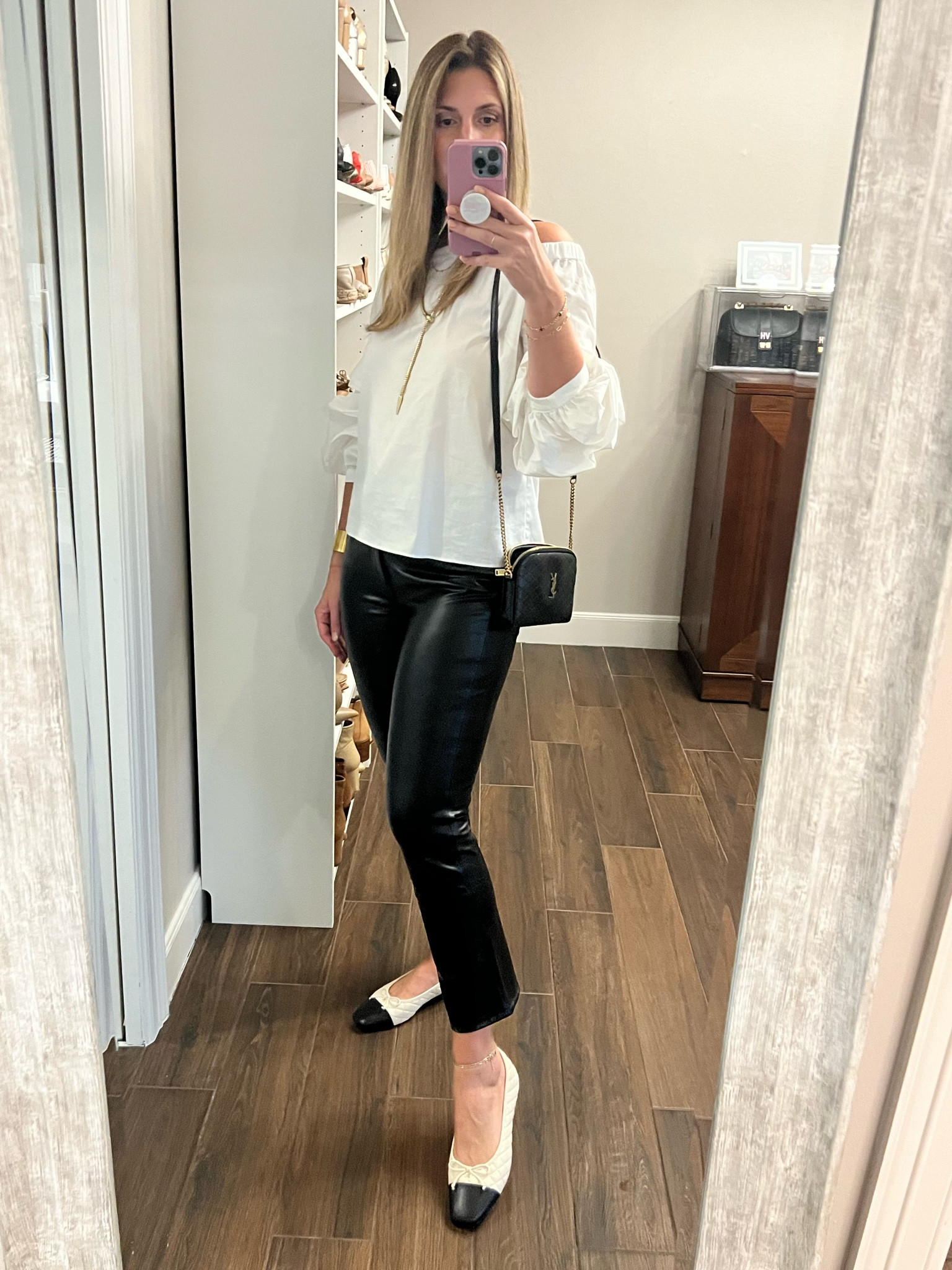 Black + white but anything but boring in this off the shoulder number paired with vegan leather pants. Dresses it down with these two tone ballet flats. 

My top is from last year but sharing some similar options. Pants run small. Size up. Shoes run TTS. 

#LTKItBag #LTKShoeCrush #LTKOver40