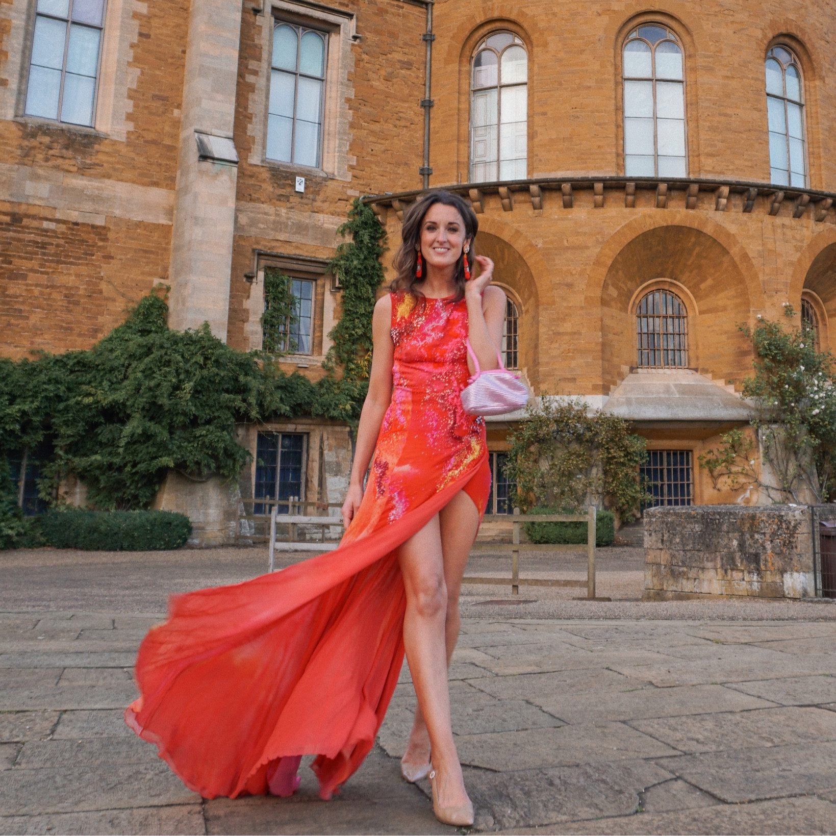 Red dress with thigh split for my friend's black tie birthday dinner ❤️ paired with a sparkly bag ❤️ this dress is embellished with sequins in yellow, pink and orange. It's vintage but I've found similar for you here ❤️

#LTKunder50 #LTKparties #LTKeurope
