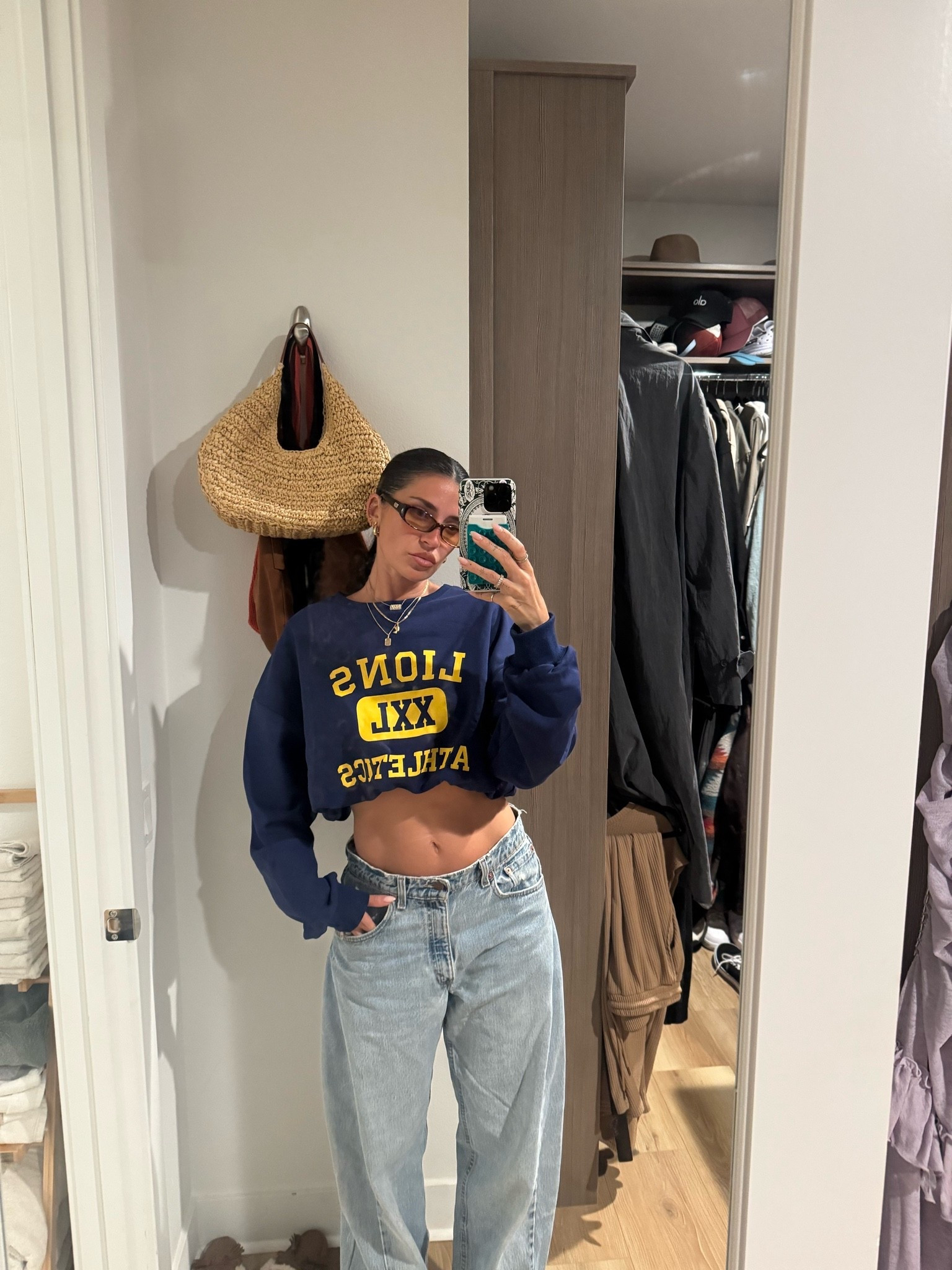Lions cropped sweatshirt and vintage Levi’s barrel jeans