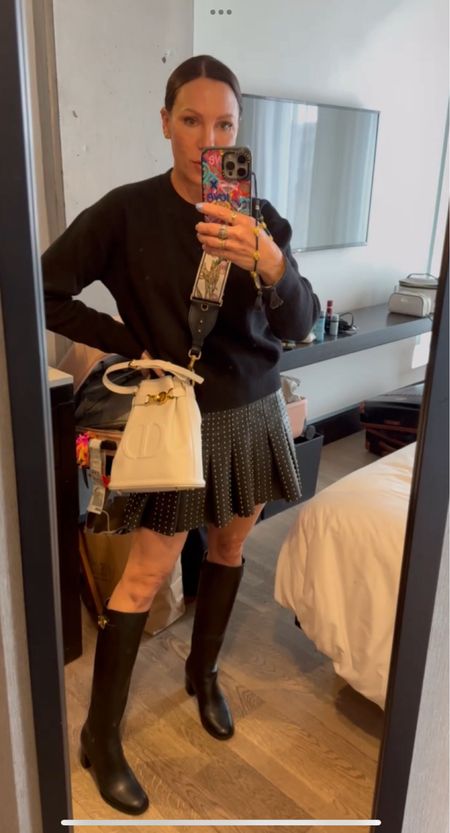 I love pairing a skirt with a sweater and tall boots. It’s the perfect spring combination! Paired with my Dior bag and floral Dior strap. Wearing size small in sweater and size small in skirt. Boots are size 7.5. 

#LTKover40 #LTKSeasonal #LTKstyletip