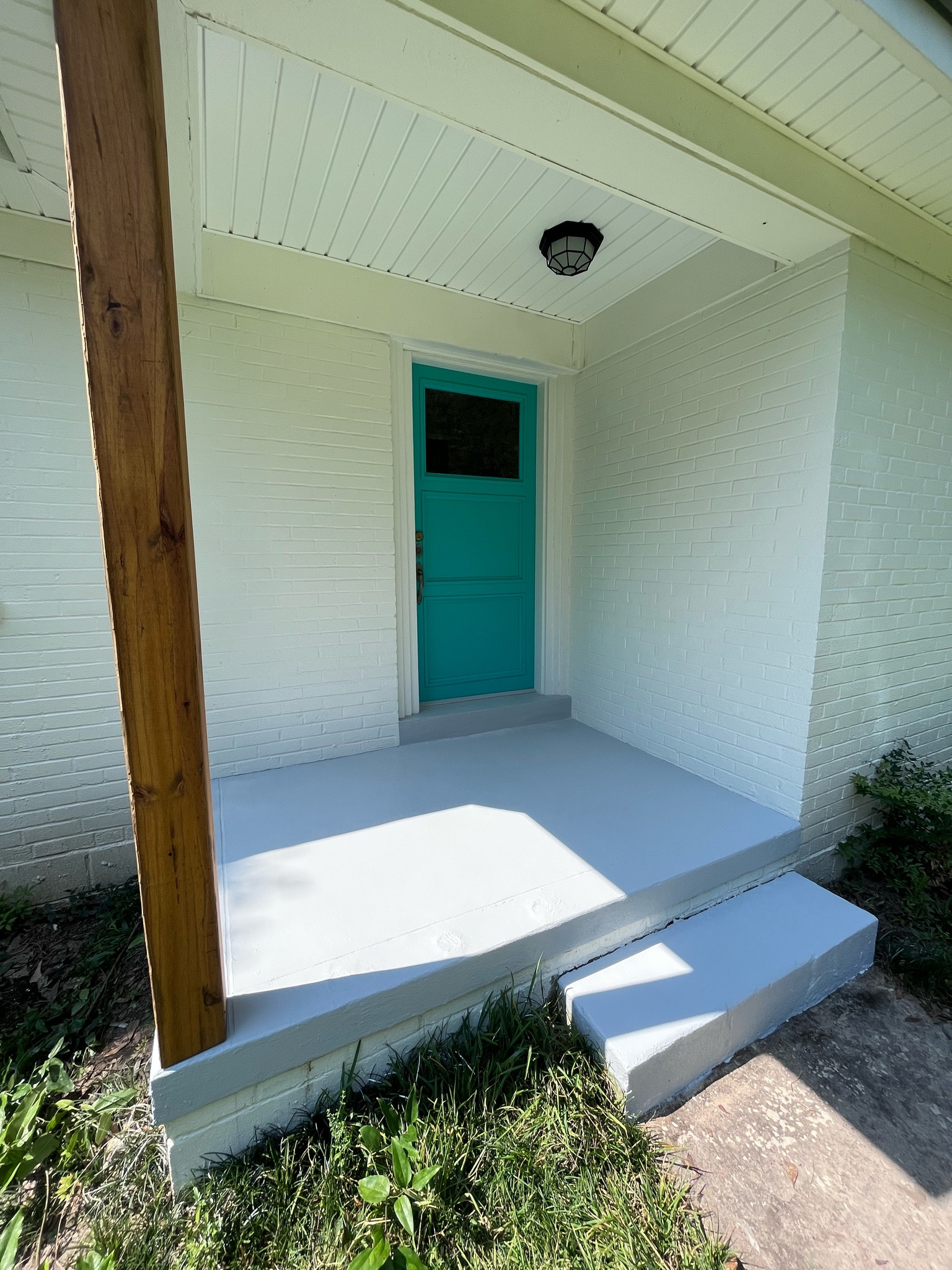 beginning stages of my porch makeover - using behr anti slip textured paint (adding a stenciled design on top to mimic tile)

prepped with concrete primer, grey base coat color is pacific fog, stencil color will be ice white

#LTKunder50 #LTKhome #LTKFind