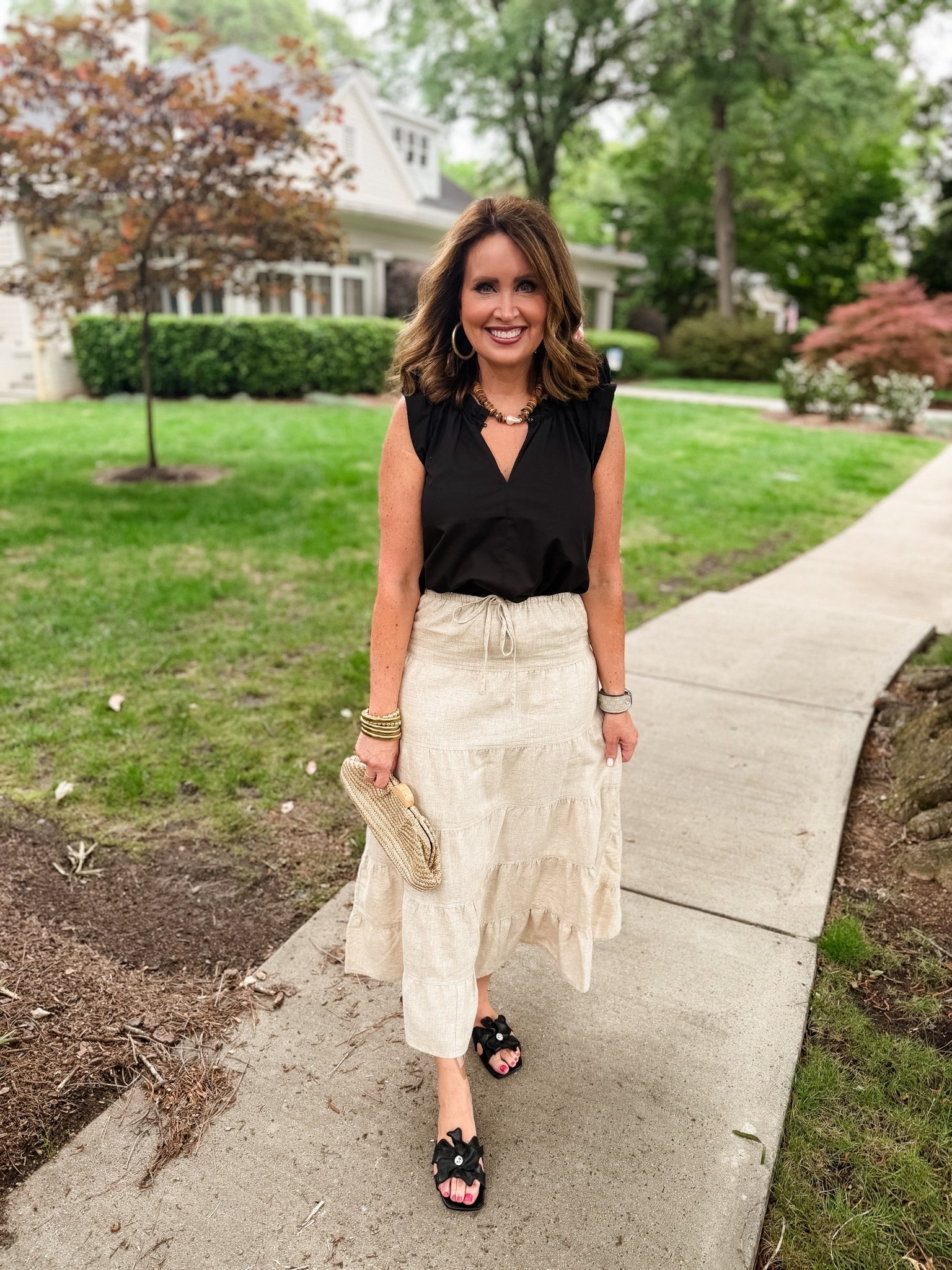 Black top & taupe linen skirt - both run true to size (small)

Use code LAURA on my earrings and necklace

#LTKOver40 #LTKootd