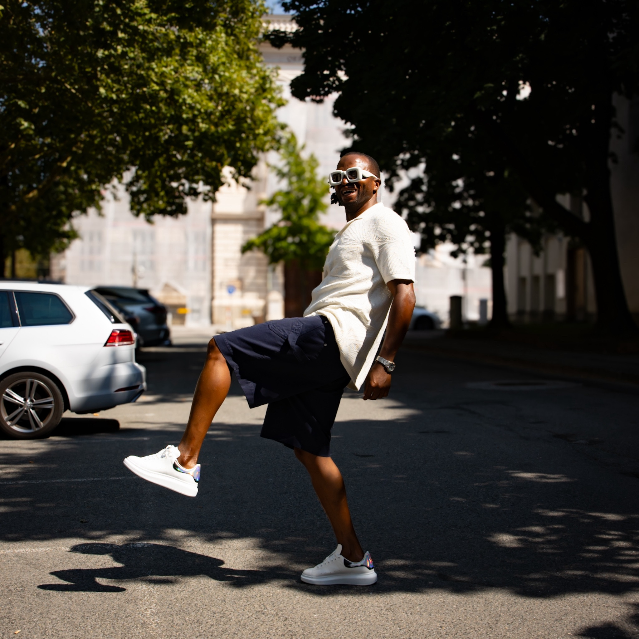 I'm serving a bold yet stylish look with an eclectic mix of designer pieces and accessories. I am sporting a pair of statement-making inflated white sunglasses from Loewe, which add an avant-garde edge to the outfit. The white crochet shirt from Samsoe brings a touch of texture and breezy elegance, perfectly contrasted with the blue twisted denim shorts from JW Anderson, which give the look a playful twist. To complete the ensemble, I am wearing sleek white sneakers from Alexander McQueen, combining comfort and luxury. Lastly, I am carrying a chic clutch from Comme des Garçons to tie everything together, incorporating a touch of high-fashion flair.#DesignerStyle #LoeweSunglasses #JWAnderson #SamsoeCrochet #AlexanderMcQueenSneakers #CommeDesGarcons #FashionForward #BoldLooks #StreetStyle #HighFashionDetails #LuxuryAccessories #FashionInspo


#LTKluxury #LTKmens #LTKstyletip