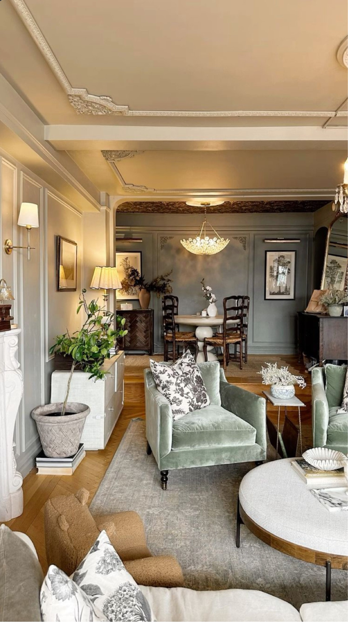 Another view of the living room - accent chairs, mini side table, dining room decor, new wall sconces and more

#LTKhome