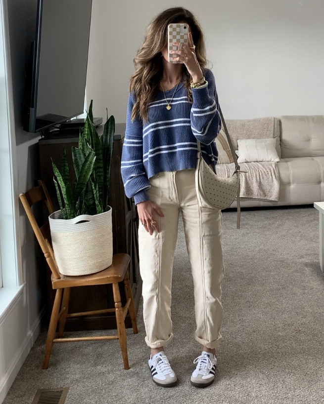 S P R I N G uniform //
Absolute perfect fit on this spring outfit. This knit sweater lays beautifully and has great stripe placement. Styled with barrel leg cargo pants, my trusted sambas, and a studded purse. 
Sized up one in the sweater for a more relaxed fit. Wearing a small here. TTS on bottoms. 

#LTKstyletip #LTKover40 #LTKSeasonal