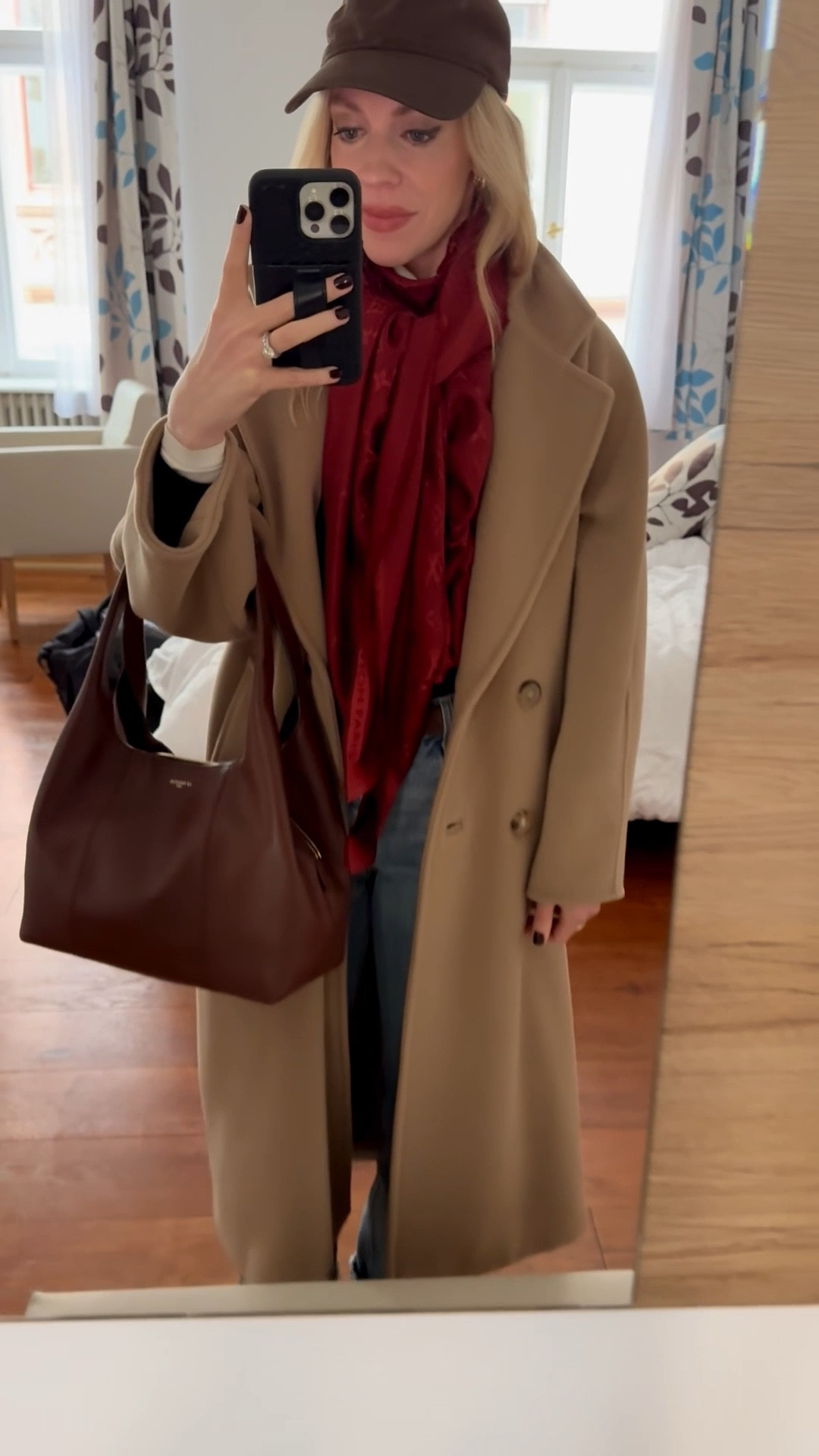 Spring travel look, European vacation, @Zara brown baseball cap, camel coat, red Louis Vuitton scarf, Levi’s baggy 90’s jeans, dark brown Le Tanneur handbag 

#LTKOver40 #LTKSaleAlert #LTKTravel