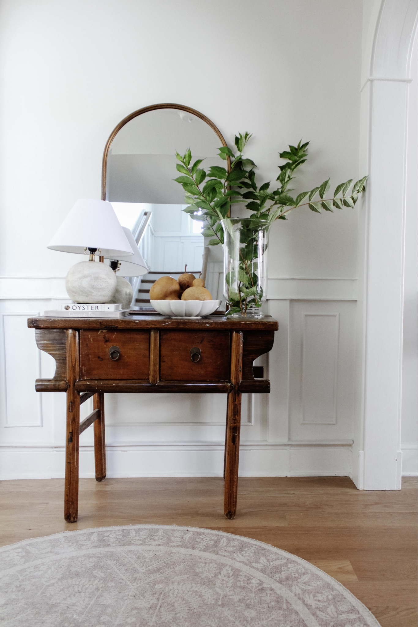 Well, here we are heading into Fall ✨ If you’re planning your seasonal decor, the August Decor Edit is a great place to look. Shop the latest affordable finds from the entire month!
•
Shop this photo and my entire home too, all from the link in bio. Message me with any questions!
•
•
•

Simple fall home decor, dried gourds, seasonal decor, fall entry, fall console, tall stems, glass vase, harvest Lamp hack, magic light, amazon finds, home decor hack, entry styling Decorative ceramic bowl, arch mirror, vintage wood console, vintage wood entry table, console decor, decor books, brass mirror, table styling, affordable home decor, round entry rug, loloi rug, small lamp, round lamp, staircase landing decor 

#LTKhome #LTKstyletip #LTKunder50