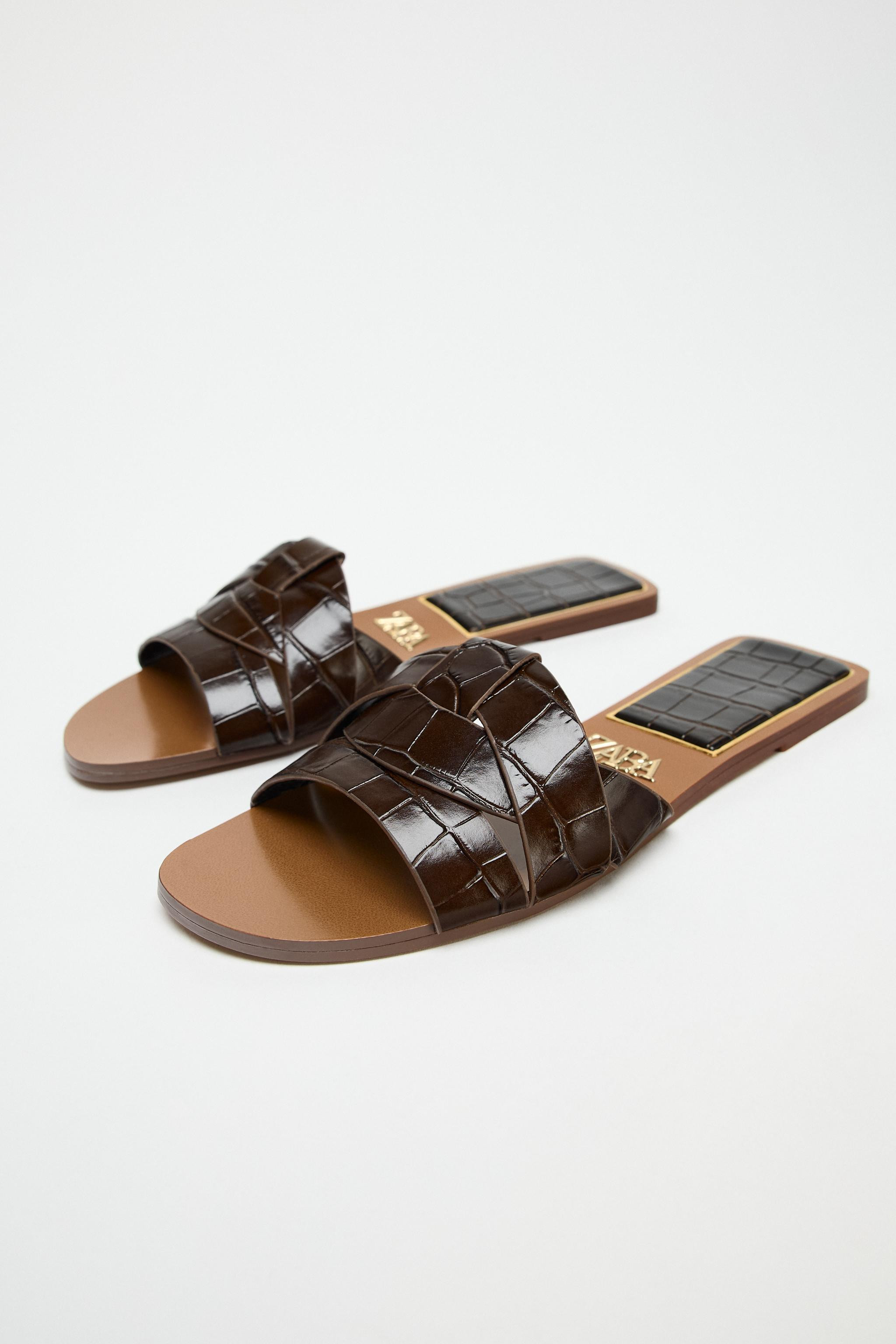 Flat embossed leather sandals. Criss-cross straps on the front.Sole height: 1 cm. / 0.3″ | Zara US
