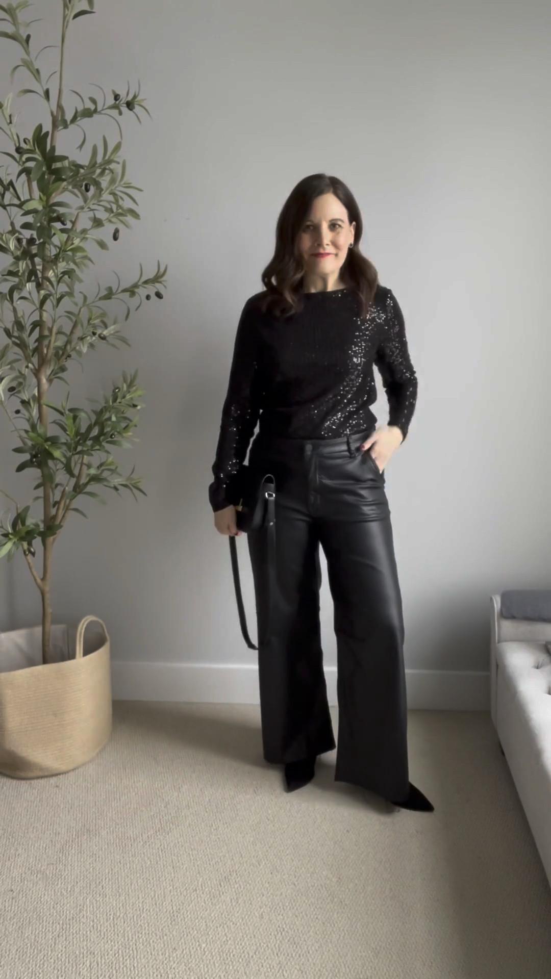 Party outfit: Pairing leather with sequins is an easy way to create a confident and glam look. The toughness of leather, whether pants or a jacket, offers a sharp contrast to the shine of sequins, resulting in a modern and edgy vibe that is perfect for a memorable night out. FIT: size up in this loft sequin top. I’m a 36B and wear a size large. These Kut From the Kloth wide leg coated jeans fit true size.


#LTKOver40 #LTKHoliday #LTKMidsize