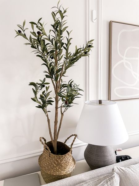 Small olive tree, table top olive tree with basket, white sofa, organic lamp

#LTKhome