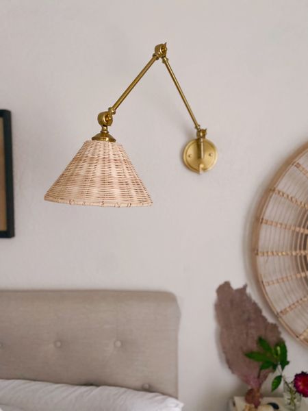 My favorite sconce light! Gorgeous brass and wicker shade for a coastal look for your interiors  

#LTKSeasonal #LTKhome