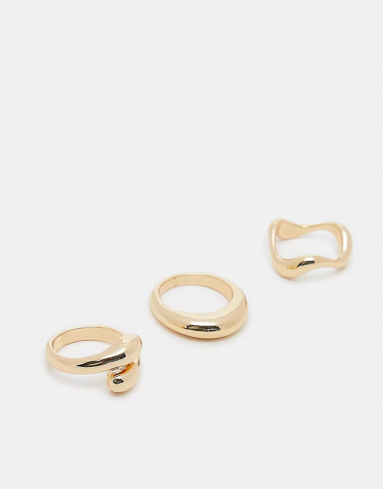 ASOS DESIGN pack of 3 rings with mixed minimal designs in gold tone | ASOS (Global)