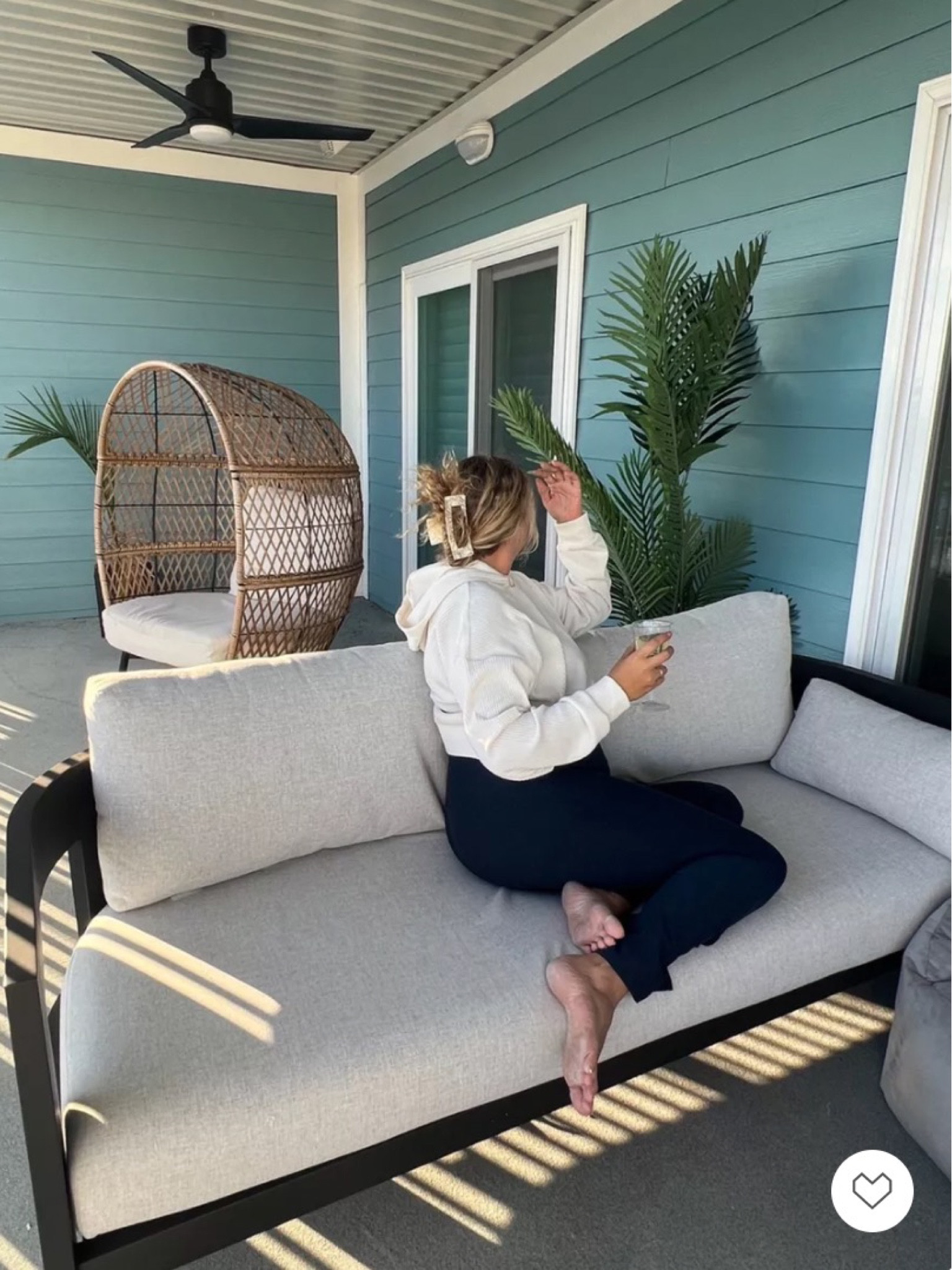This patio might be my favorite place! Patio furniture, outdoor furniture, casual outfit, loungewear, alo yoga, beyond yoga, costa farms, outdoor plants, patio couch, patio chair, wicker outdoor chair

#LTKFind #LTKSeasonal #LTKhome
