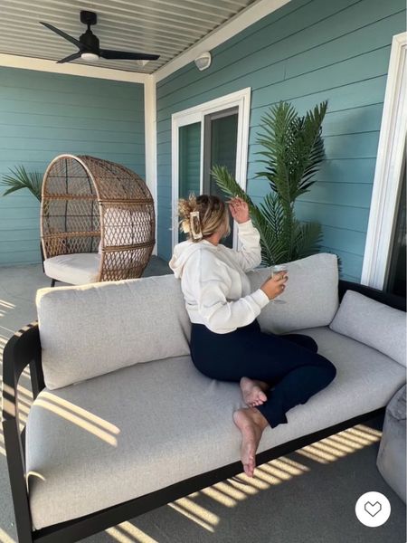 This patio might be my favorite place! Patio furniture, outdoor furniture, casual outfit, loungewear, alo yoga, beyond yoga, costa farms, outdoor plants, patio couch, patio chair, wicker outdoor chair

#LTKFind #LTKSeasonal #LTKhome