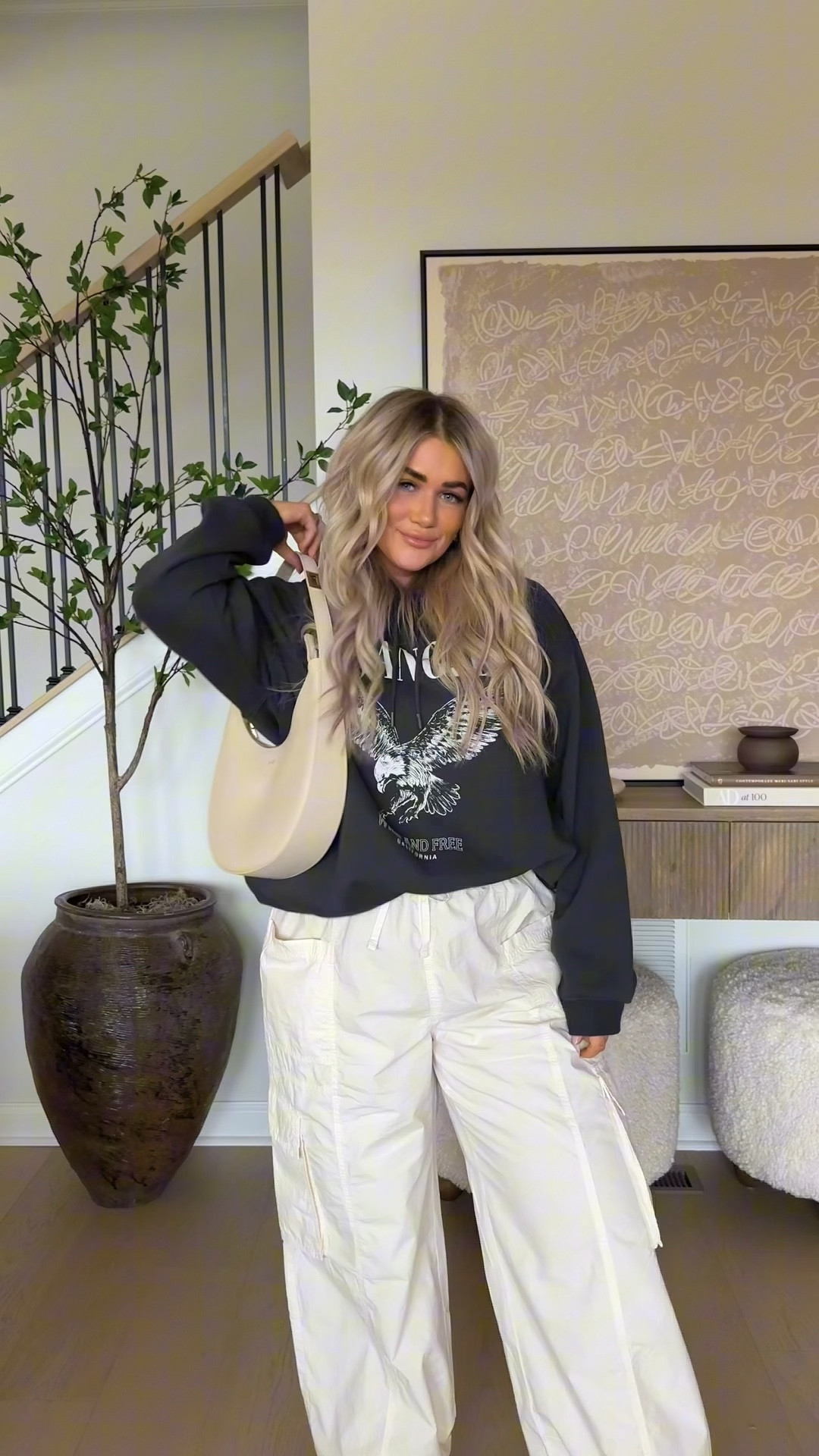 Same base, two ways — Millennial & GenZ 🤍 DAY 4!! Favorite cargos are now online & available in 6 color ways. 

Top// medium
Pant // large 
Hoodie // large 
Trench // large 

#midsize #midsizestyle #stylingbasics #millennial #genz #size10fashion #trenchcoat #cargopants #howtostyle 