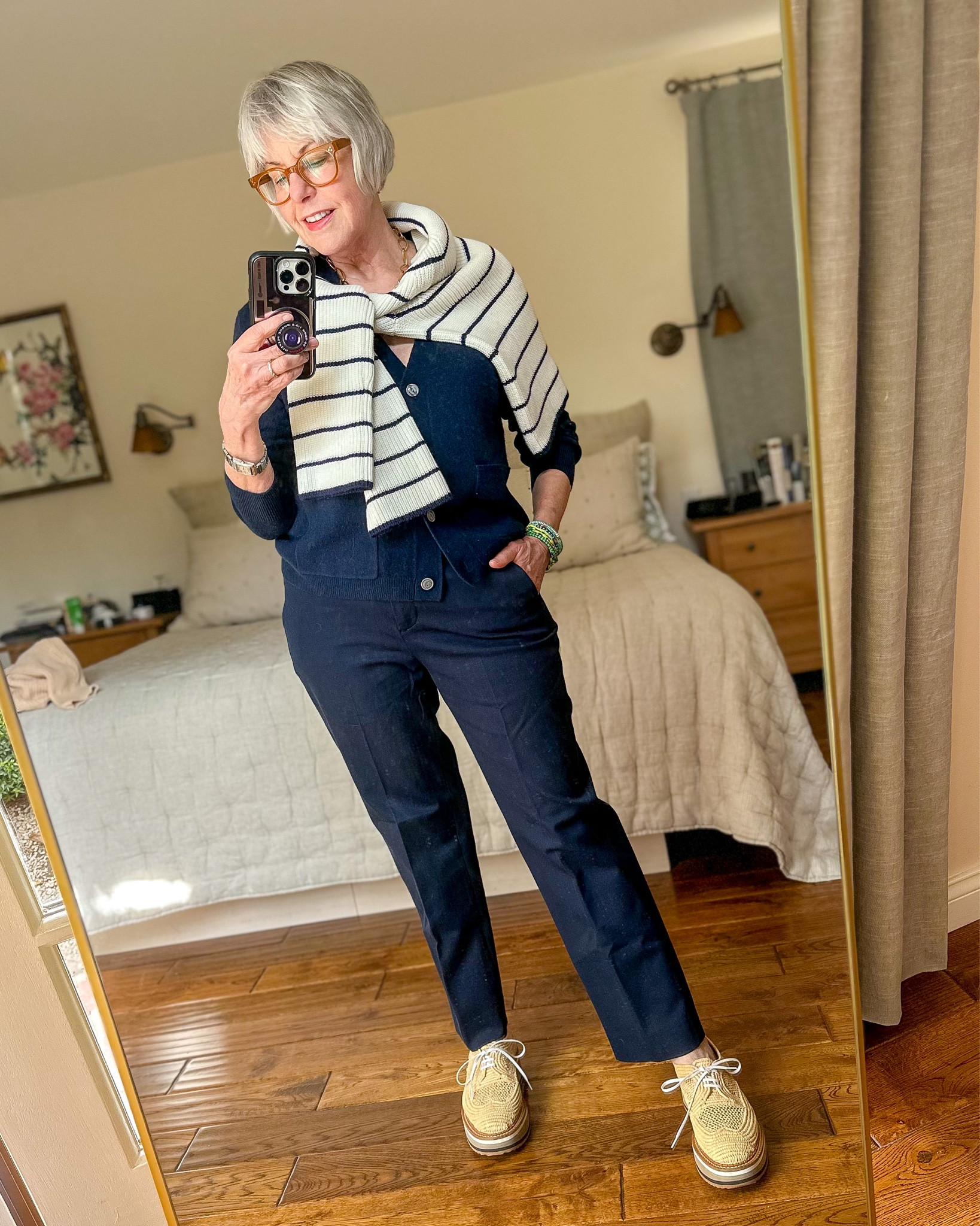 Navy outfit with layered sweaters…love how this striped cotton sweater looks tied over the shoulders. 

Wearing size 6 petite in the trousers, XS navy cardigan, S in ribbed cotton striped sweater  

#LTKstyletip #LTKSeasonal