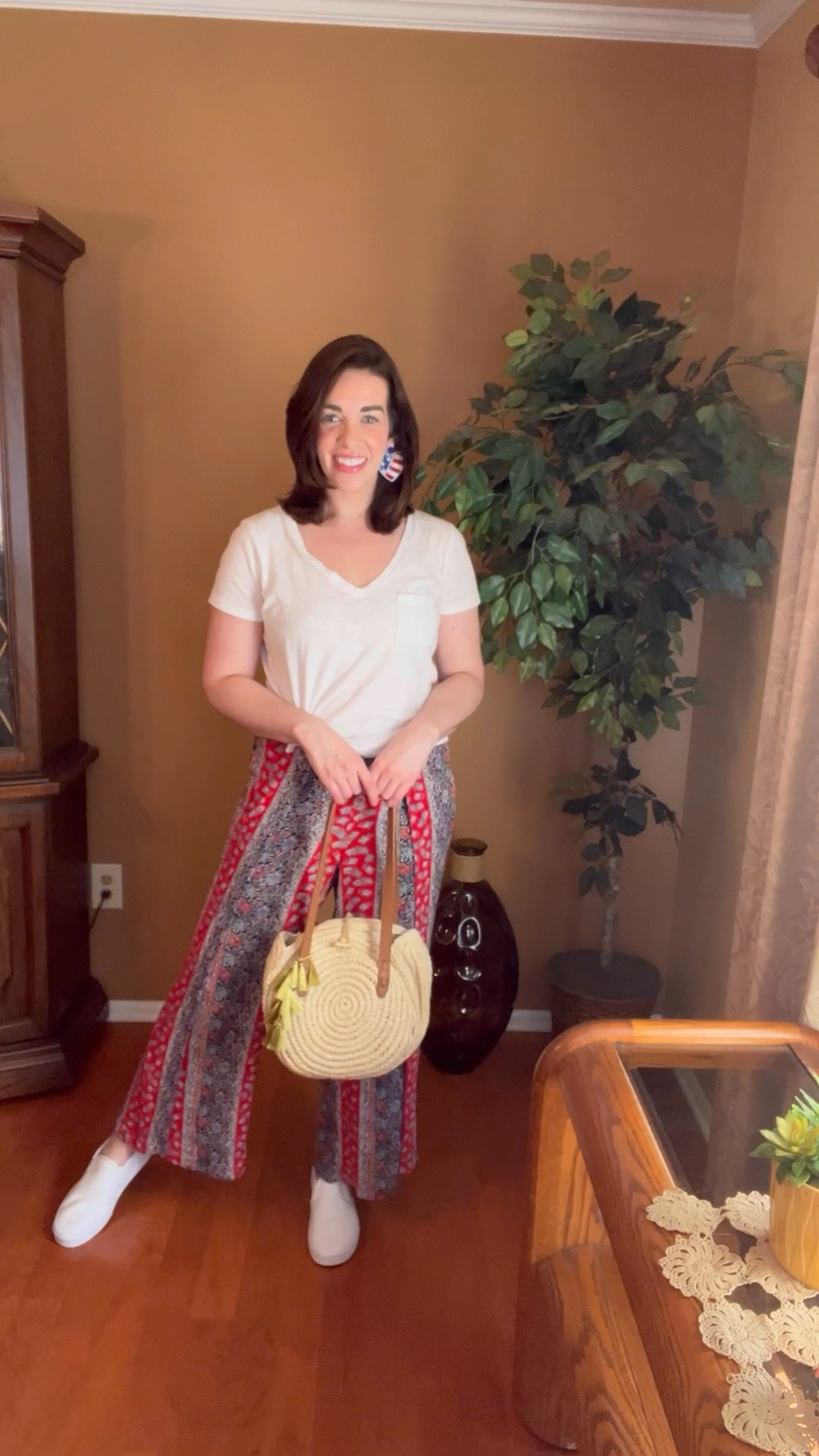 Spring Outfit - White v neck tshirt (size small). Red, white and blue paisley pants (size small). White sneakers (size 8.5). Bralette (size medium). #whitetshirt #tee #whitetee #tshirt #vnecktshirt #paisleypants #pants #drawstringpants #circletote #tote #strawbag #sneakers #whitesneakers #casualoutfit 

#LTKSeasonal #LTKStyleTip #LTKFindsUnder100