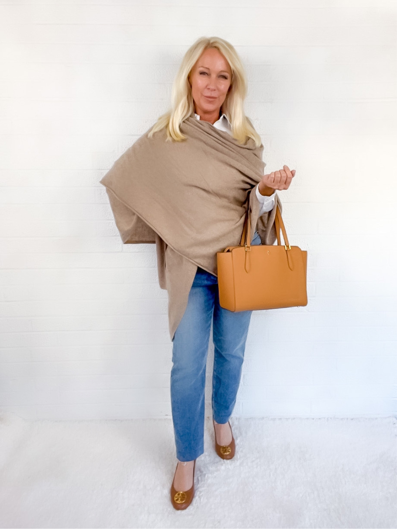 Straight leg jeans styled with a neutral cashmere poncho. Classic timeless style!

Over 40 over 50 over 60

#LTKunder50 #LTKstyletip #LTKSeasonal
