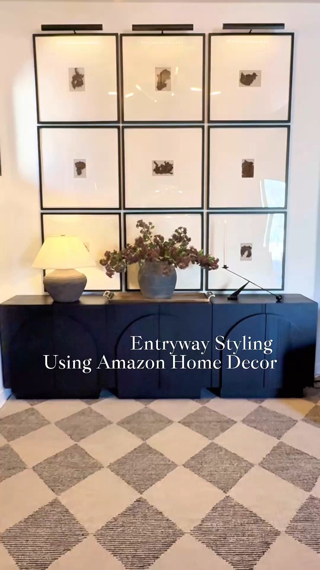 This transformation is one of my favorites so I am sharing it once more! Dark burgundy stems in a rustic pot set the tone. Add a touch of elegance with a black arched sideboard and modern frames for a chic gallery wall. Illuminate with battery-operated picture lights, and complete the look with a modern rustic lamp and floating candle holder.

#amazonfinds #amazonhome #entrywaystyling #sideboard #gallerywall #picturelights #cozyentryway #founditonamazon #archedcabinet #aestheticdecor #aestheticfinds 


#LTKStyleTip #LTKHome #LTKU