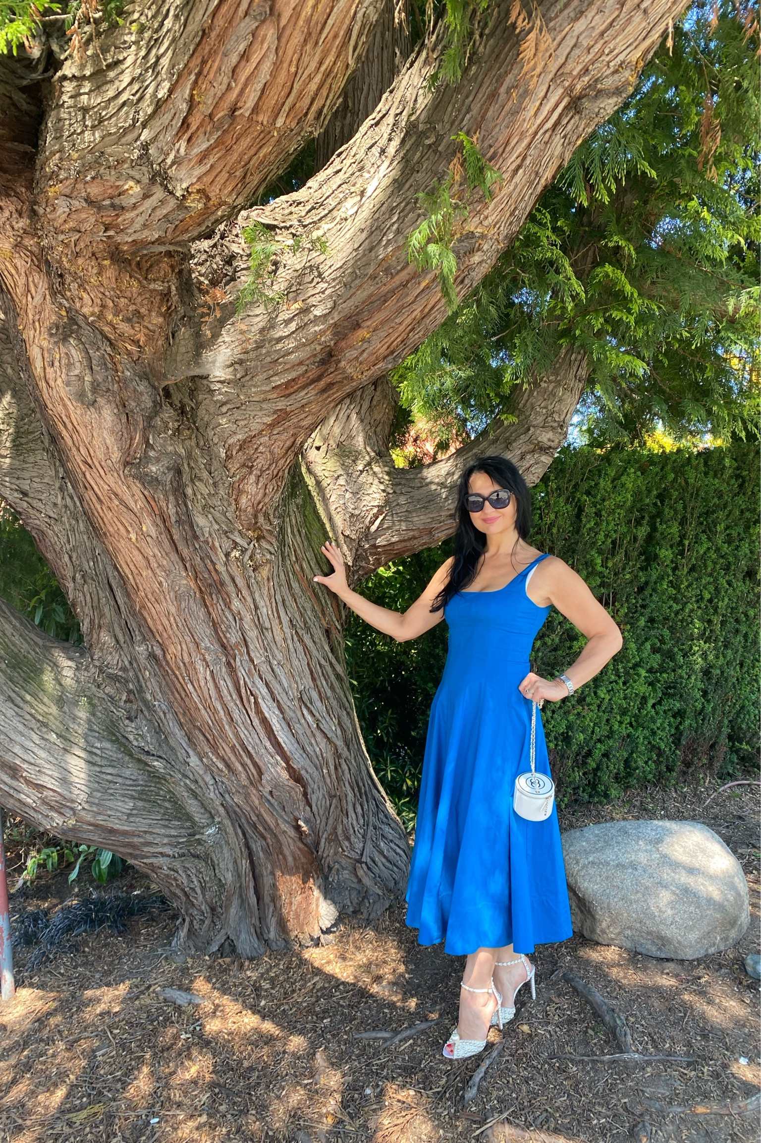 Transitional dress, pearl shoes, white bag.

#LTKparties #LTKitbag #LTKshoecrush