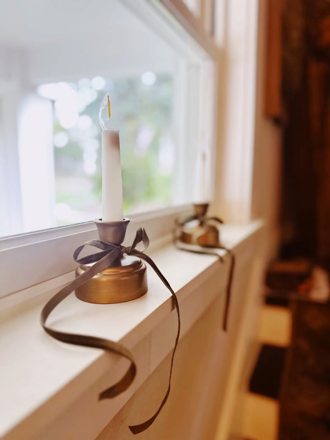 These are the sweetest little candlestick lights!

They are so beautiful lit up in the windows at night. 

They are battery operated and I added a narrow velvet ribbon to the base for a little something extra. 

So fun for the holidays!

#christmasdecor #holidaydecorating 

#LTKHoliday #LTKSeasonal #LTKHome