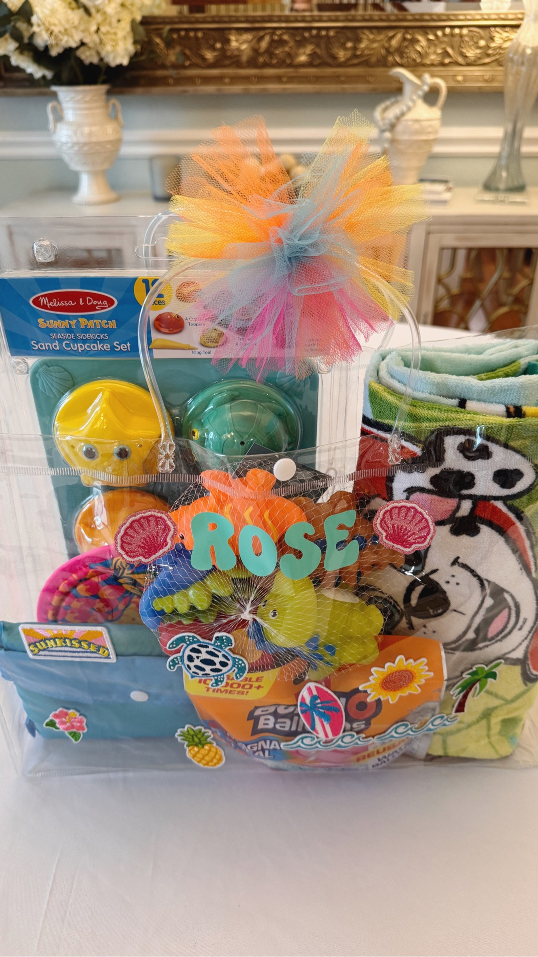 The cutest personalized beach surprise bag for kids 🌴🎀✨ From beach toys and sand cupcakes to reusable water balloons and the sweetest little beach towel… this was such a fun way to make our family beach trip extra magical 💖 Everything linked here including the clear beach bag, Cricut Joy, beach goodies, and bow supplies! #LTKfamily #LTKsummer

#LTKKids #LTKTravel