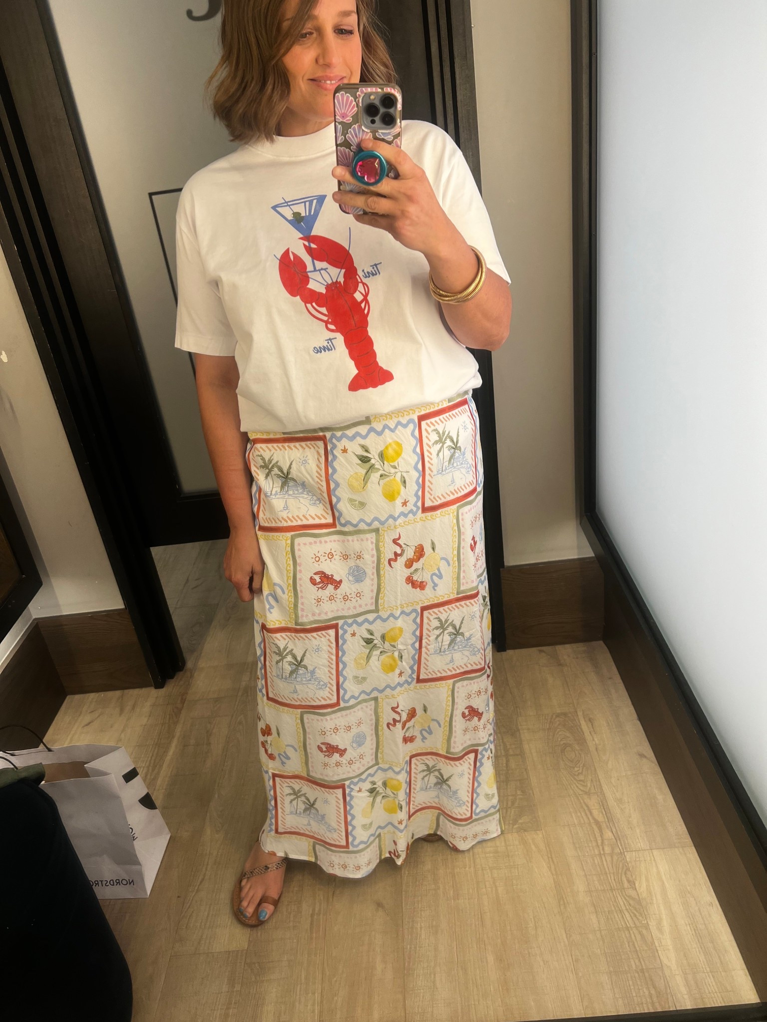 Obsessed with the print of this skirt and this adorable “tini time” t-shirt. 