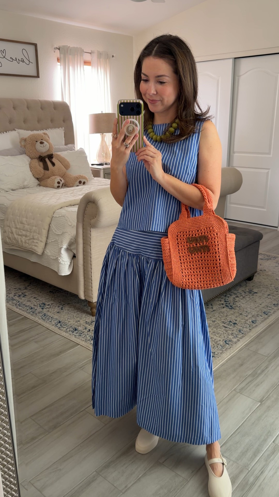 The striped midi that doesn’t overwhelm a 5’2 frame.

Matching sets and drop-waist styles can feel tricky when you’re petite, but this one works because the bodice is clean and structured, and the stripe direction helps define your shape instead of drowning it. The waist seam hits in the right spot, and the midi length works with flats.

I paired it with simple Mary Jane flats to keep it practical for real life, and a pop of color bag to break up the blue. This is one of those statement pieces that still feels wearable.

High cost-per-wear because you can separate it — the top works with denim, and the skirt pairs with a simple white tee or tank.

Xsp skirt
Xs top 


#LTKPetite #LTKootd