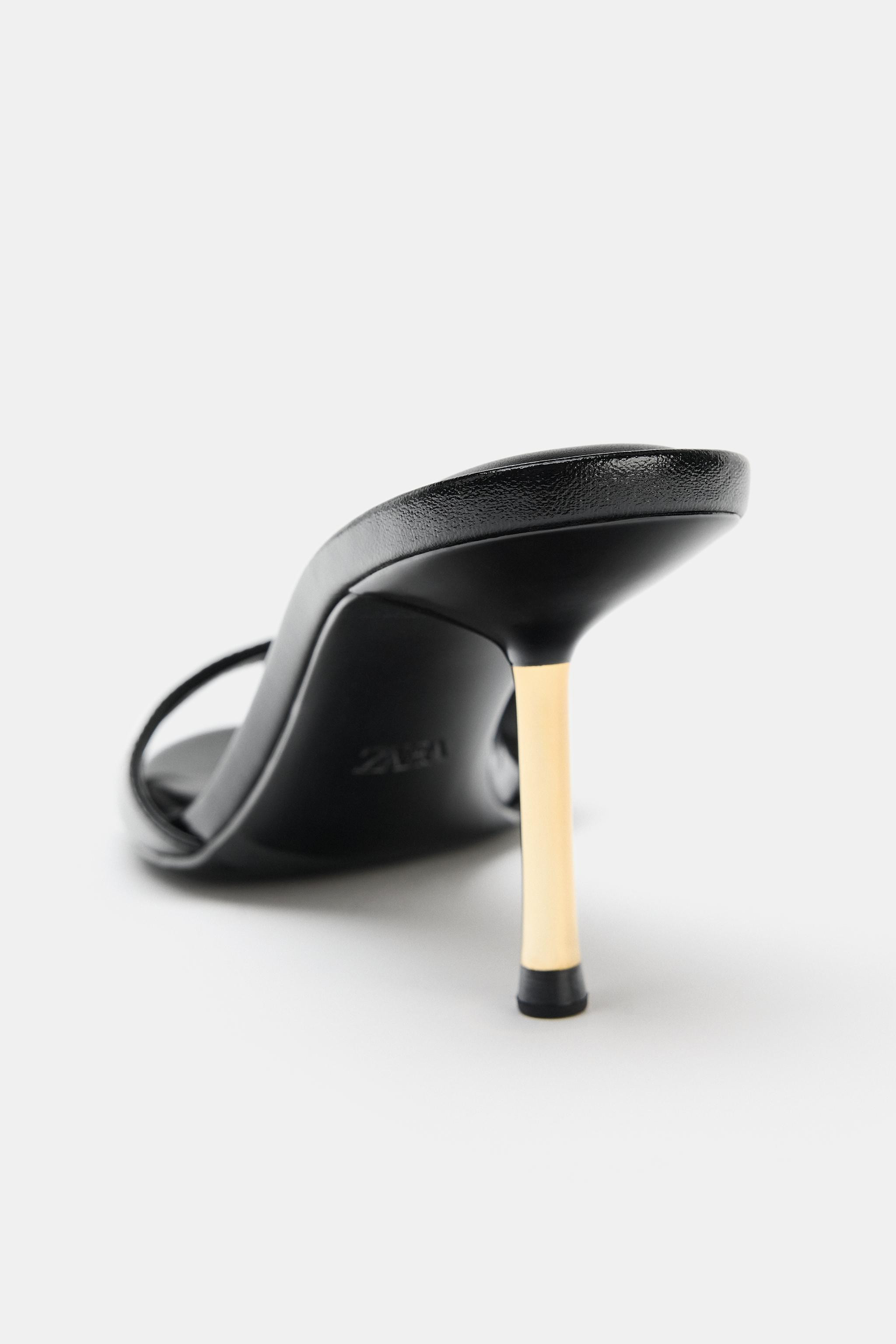 Heeled sandal-style shoes. Mule design. High, thin stiletto heel with a metallic finish. Rounded ... | Zara US