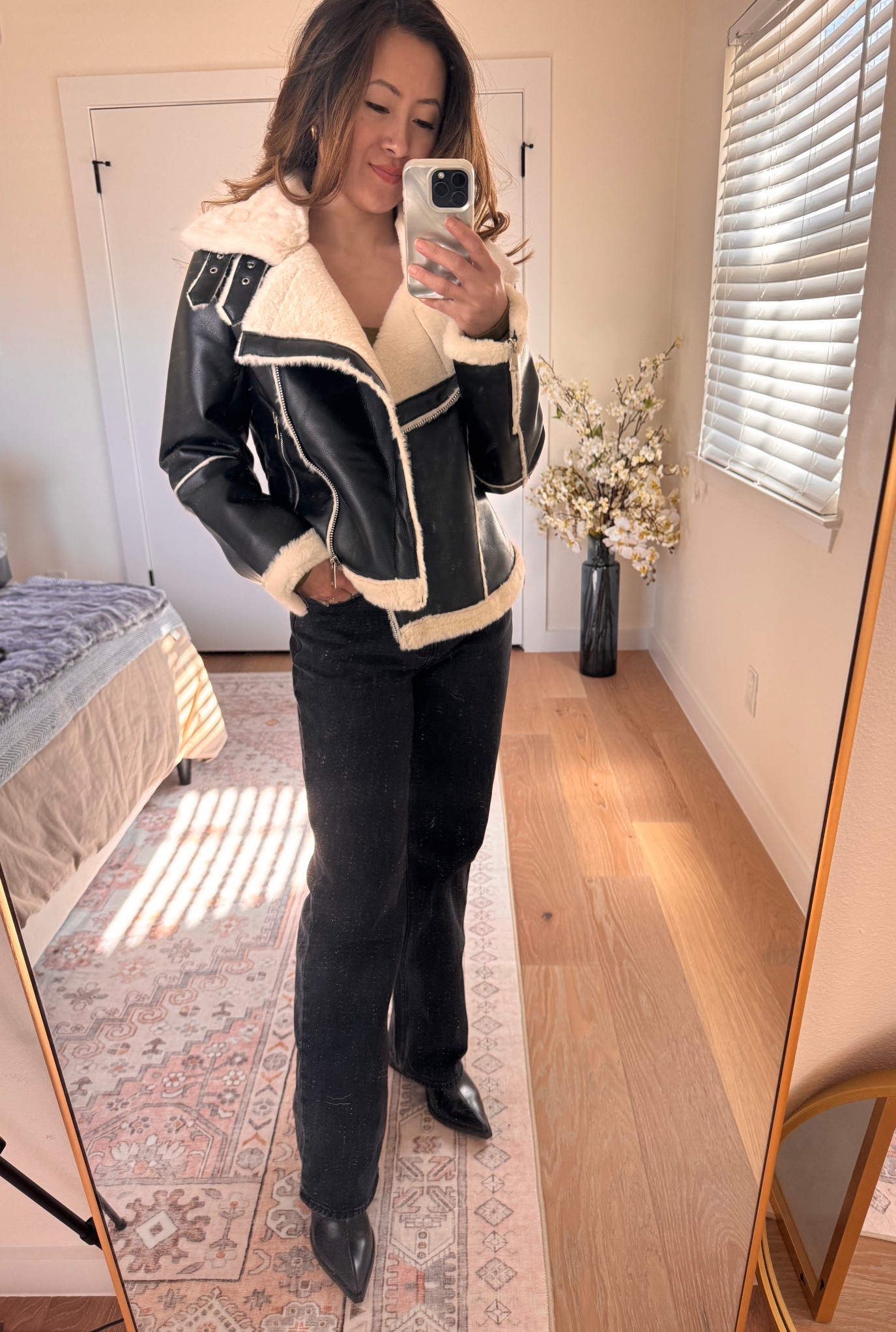 Getting ready for a cold winter with this Faux fur and Faux leather jacket. I love the Silver zipper details and the high neck buckle. It keeps me really warm!

#LTKgrwm #LTKootd #LTKSeasonal