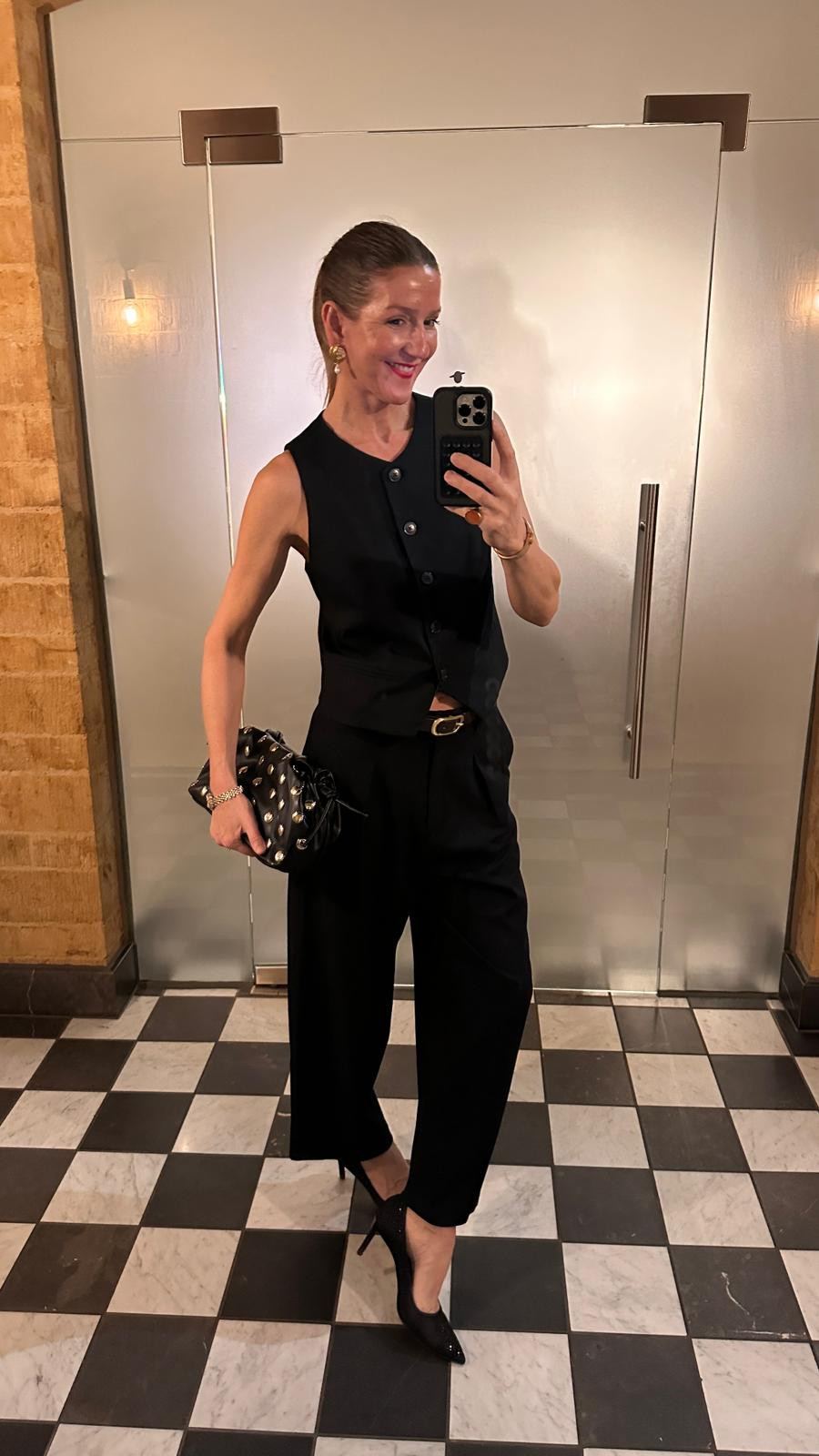 M&S evening look. black trousers, black waistcoat, black court heels, black leather studed bag.  

 #LTKFashionMonth #LTKuk #LTKstyletip