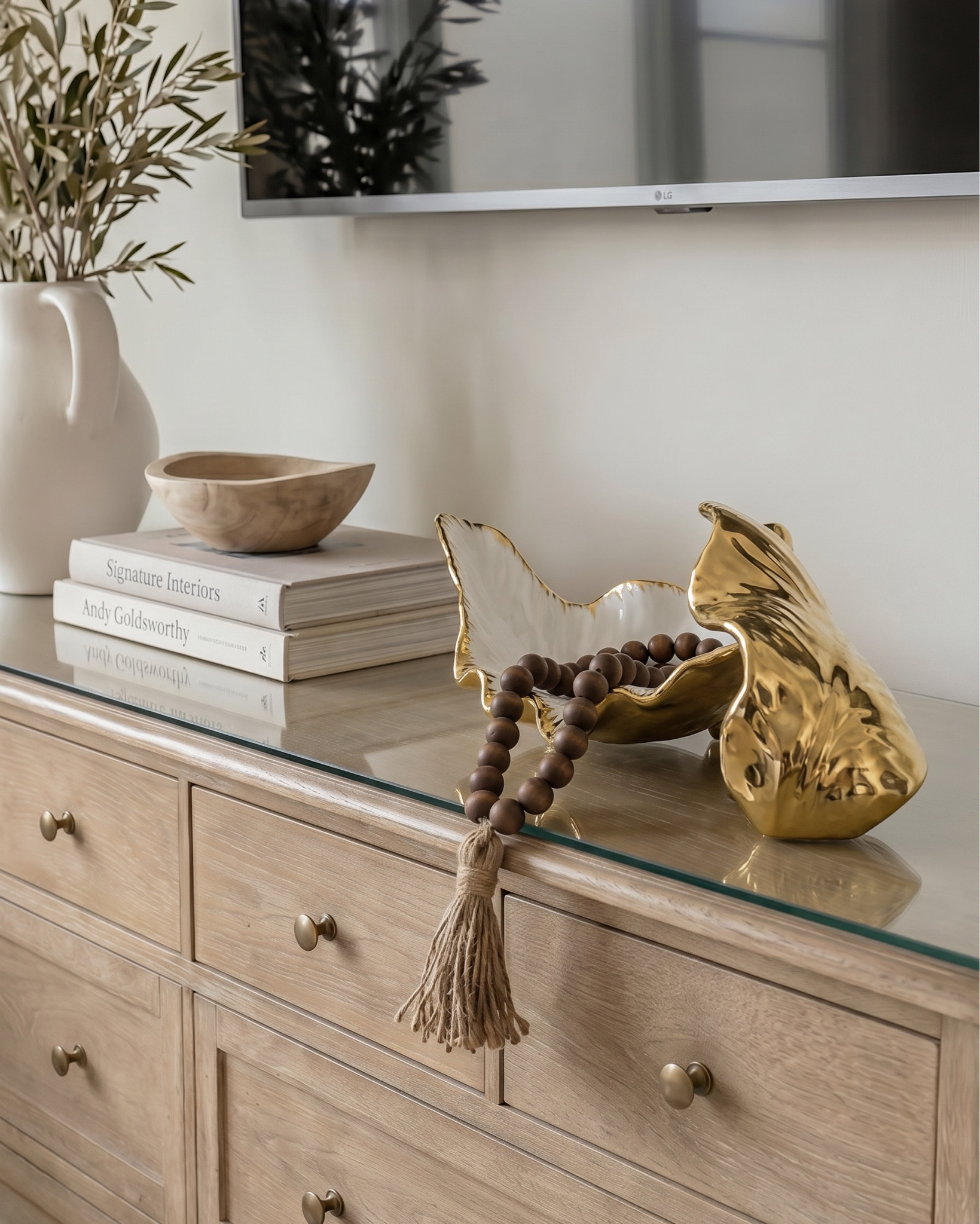 * light wood bed frame
* curved wood headboard
* white bedding set
* cream knit throw blanket
* beige patterned lumbar pillow
* white standard pillows
* boucle bench ottoman
* light wood nightstands
* fluted ceramic table lamps
* white drum lamp shades
* gold wall sconces
* gold chandelier
* vintage gold wall mirrors
* neutral abstract wall art
* beige area rug
* decorative bowl decor
* solid wood dining table
* pedestal dining table base
* cane back dining chairs
* upholstered seat dining chairs
* neutral textured area rug
* gold chandelier lighting
* wood sideboard cabinet
* arched glass cabinet
* ceramic table vase
* floral arrangement centerpiece
* table styling decor


#LTKSaleAlert #LTKHome