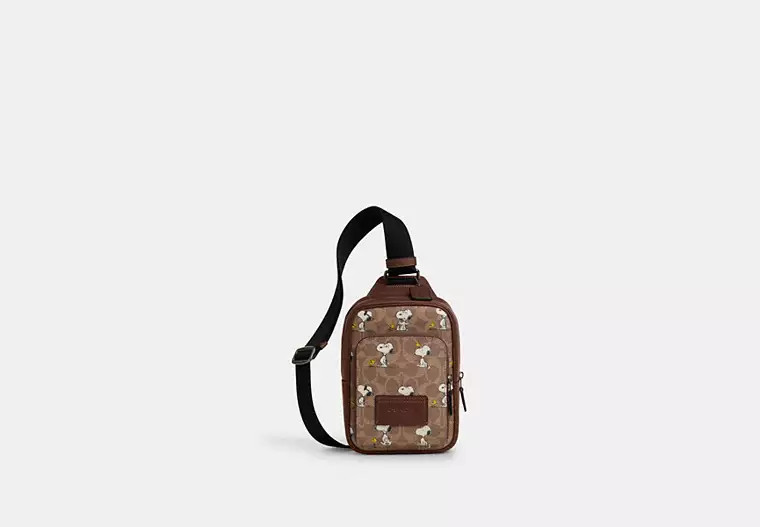 Coach X Peanuts Racer Sling Pack In Signature Canvas With Snoopy Print | Coach Outlet US
