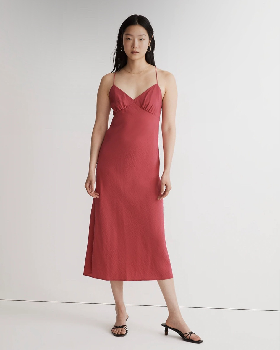 Woven with eco-friendly Lenzing™ Ecovero™ fibers and printed with wavy stripes, this fan-favorite midi slip dress drapes beautifully on the body. With thin cami straps, a sexy V-neckline and angular seaming at the bust, it's the perfect one-and-done party piece, or wear it layered for an easy pared-down moment.

#LTKunder100 

#LTKwedding #LTKSeasonal