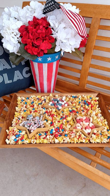 Here are the links to create this red, white, and blue popcorn board. My exact tray is here from Target along with some of the treats. Linked my graphic tee, and more! 

Wooden star bowls are out of stock, so I linked others! 

#LTKHome #LTKFindsUnder50 #LTKVideo