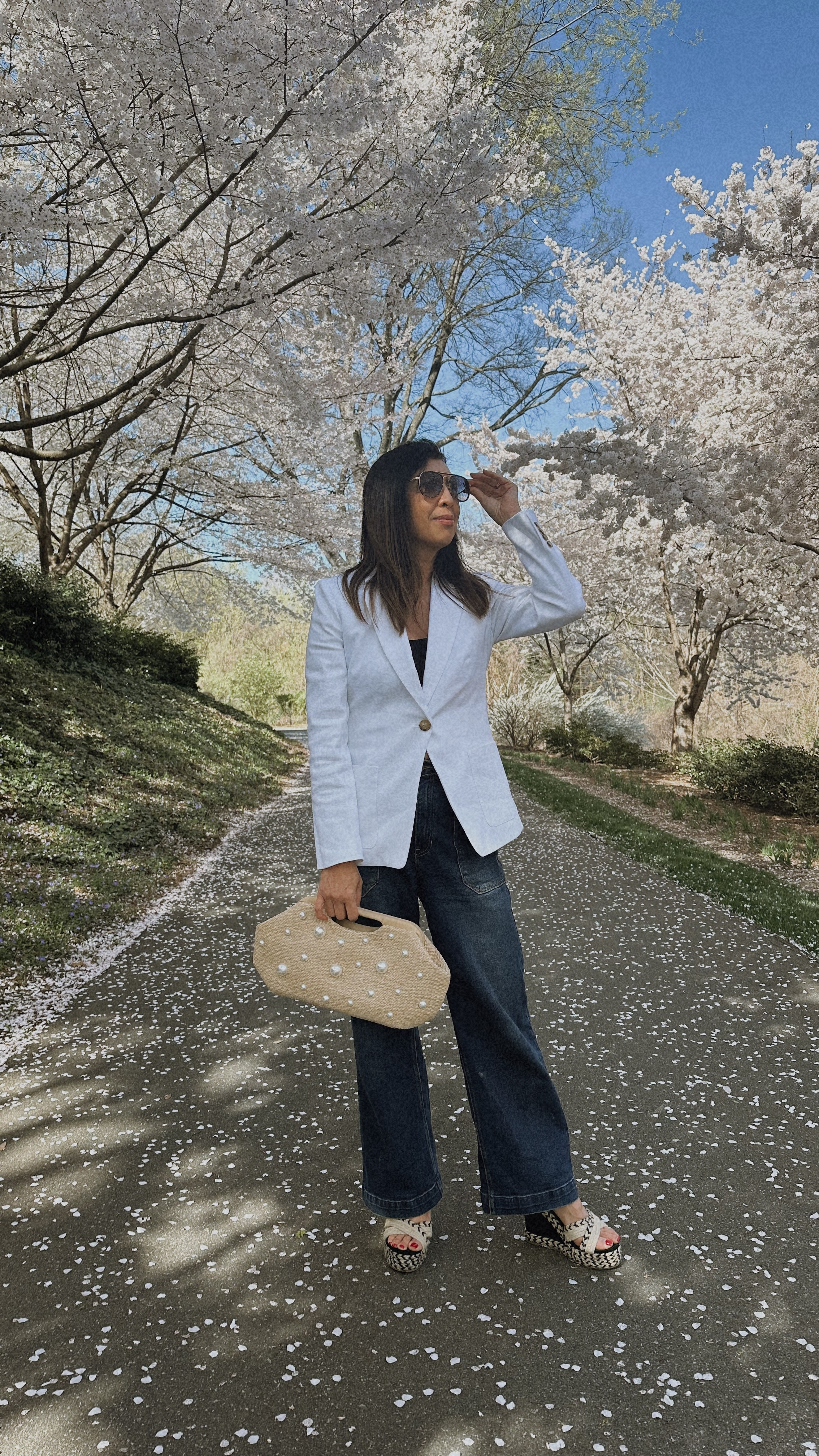 A white blazer and rattan clutch goes well with spring everything. 

#LTKOver40 #LTKSaleAlert #LTKSeasonal
